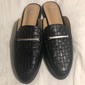 Women’s size 8 1/2 black shoes.